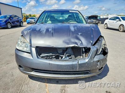 Piąte zdjęcie samochodu w środku: 2006 NISSAN ALTIMA 2.5 VIN:1N4AL11DX6C167790 - miniatura