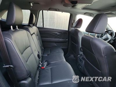 Zdjęcie 11 z 13 samochodu: 2021 HONDA PILOT TOURING VIN:5FNYF6H93MB062622 - miniatura