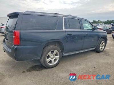 Trzecie zdjęcie samochodu z tyłu: 2015 CHEVROLET SUBURBAN K1500 LT VIN:1GNSKJKCXFR685099 - miniatura