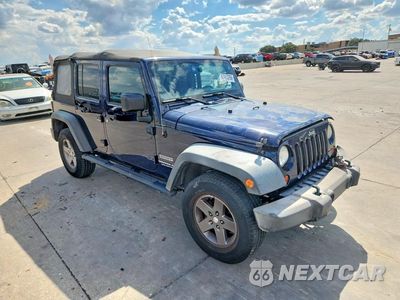 Czwarte zdjęcie samochodu z boku: 2013 JEEP WRANGLER UNLIMITED SPORT VIN:1C4BJWDGXDL554280 - miniatura