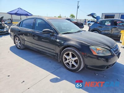Czwarte zdjęcie samochodu z boku: 2002 NISSAN ALTIMA 3.5 SE VIN:1N4BL11D22C119067 - miniatura