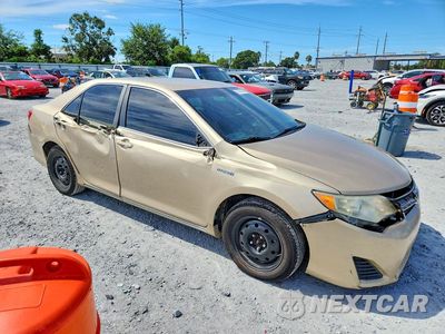 Czwarte zdjęcie samochodu z boku: 2012 TOYOTA CAMRY HYBRID LE VIN:4T1BD1FKXCU028327 - miniatura
