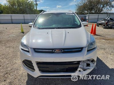 Piąte zdjęcie samochodu w środku: 2016 FORD ESCAPE TITANIUM VIN:1FMCU0JX2GUC57690 - miniatura