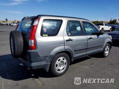 Trzecie zdjęcie samochodu z tyłu: 2005 HONDA CR-V LX VIN:JHLRD68525C010925 - miniatura