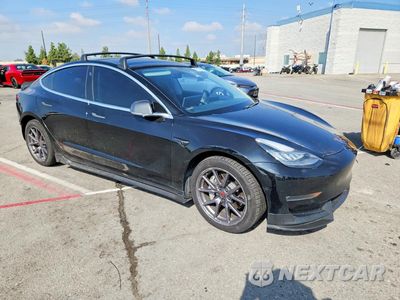 Czwarte zdjęcie samochodu z boku: 2020 TESLA MODEL 3 VIN:5YJ3E1EB6LF663061 - miniatura