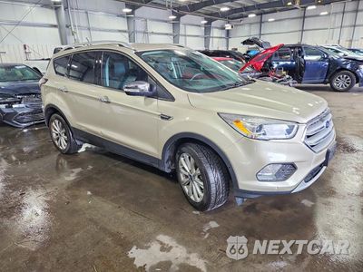 Czwarte zdjęcie samochodu z boku: 2018 FORD ESCAPE TITANIUM VIN:1FMCU9J93JUB43985 - miniatura