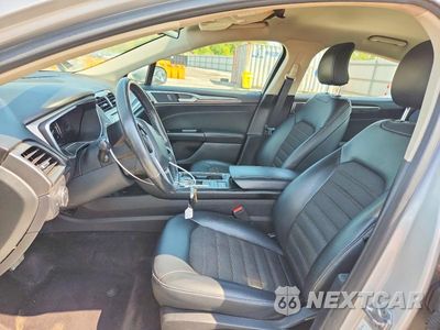 Zdjęcie 7 z 12 samochodu: 2017 FORD FUSION SE HYBRID VIN:3FA6P0LU9HR222803 - miniatura