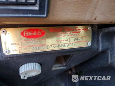 Zdjęcie 13 z 13 samochodu: 2001 PETERBILT 330 - FLAT BED TRUCK VIN:2NPNHD6X41M569747 - miniatura