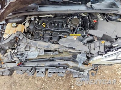Zdjęcie 11 z 12 samochodu: 2016 FORD FOCUS TITANIUM VIN:1FADP3J23GL241838 - miniatura