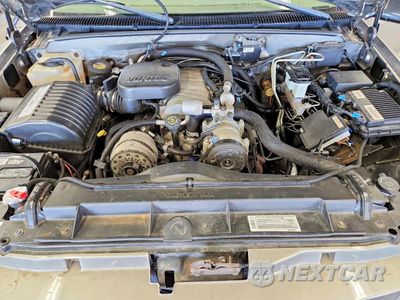 Zdjęcie 12 z 13 samochodu: 1999 GMC SUBURBAN K2500 VIN:3GKGK26J5XG527661 - miniatura