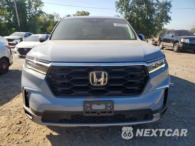 Piąte zdjęcie samochodu w środku: 2025 HONDA PILOT TOURING VIN:5FNYG1H70SB097212 - miniatura