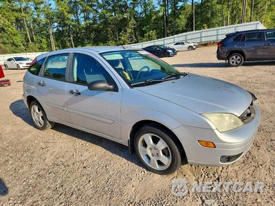 Czwarte zdjęcie samochodu z boku: 2006 FORD FOCUS ZX5 VIN:1FAHP37N26W233312 - miniatura
