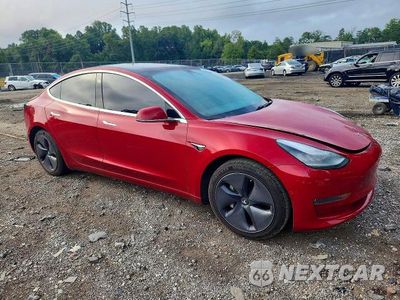 Czwarte zdjęcie samochodu z boku: 2019 TESLA MODEL 3 VIN:5YJ3E1EA5KF307108 - miniatura