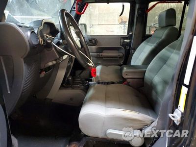 Zdjęcie 7 z 12 samochodu: 2007 JEEP WRANGLER SAHARA VIN:1J8GA59107L225704 - miniatura