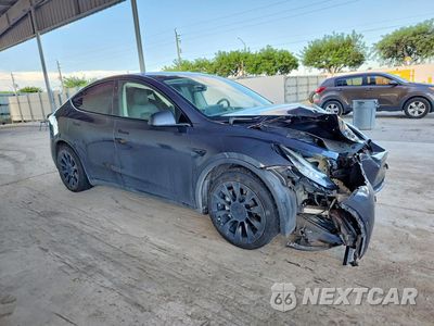 Czwarte zdjęcie samochodu z boku: 2021 TESLA MODEL Y VIN:5YJYGDEE1MF111478 - miniatura