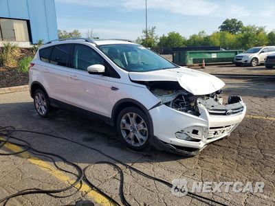 Czwarte zdjęcie samochodu z boku: 2016 FORD ESCAPE TITANIUM VIN:1FMCU0J94GUA38375 - miniatura