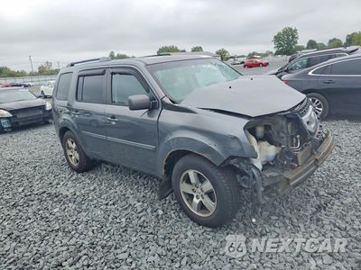 Czwarte zdjęcie samochodu z boku: 2011 HONDA PILOT EXL VIN:5FNYF4H50BB095656 - miniatura