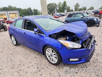 Czwarte zdjęcie samochodu z boku: 2015 FORD FOCUS TITANIUM VIN:1FADP3J27FL313316 - miniatura