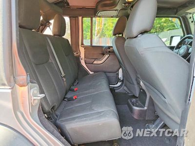 Zdjęcie 11 z 13 samochodu: 2015 JEEP WRANGLER UNLIMITED SPORT VIN:1C4BJWDG1FL771185 - miniatura