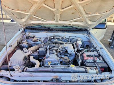 Zdjęcie 11 z 12 samochodu: 2004 TOYOTA TACOMA BASE VIN:5TENL42N74Z435200 - miniatura