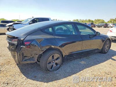 Trzecie zdjęcie samochodu z tyłu: 2022 TESLA MODEL 3 VIN:5YJ3E1EB6NF167423 - miniatura