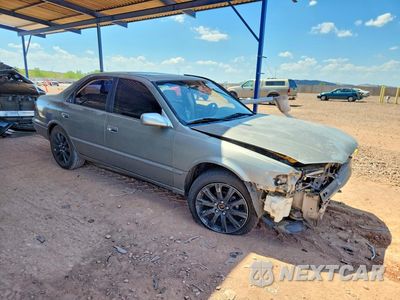 Czwarte zdjęcie samochodu z boku: 1999 TOYOTA CAMRY LE VIN:JT2BG28KXX0283841 - miniatura