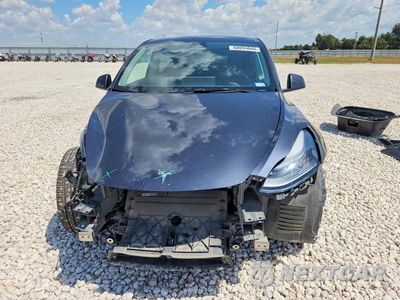 Piąte zdjęcie samochodu w środku: 2025 TESLA MODEL Y VIN:7SAYGDED5SA356241 - miniatura