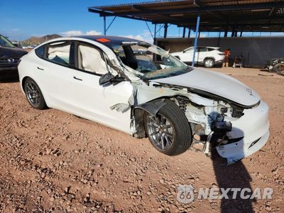 Czwarte zdjęcie samochodu z boku: 2022 TESLA MODEL 3 VIN:5YJ3E1EA7NF148256 - miniatura