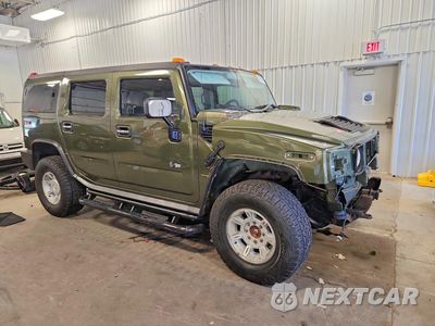 Czwarte zdjęcie samochodu z boku: 2004 HUMMER H2 VIN:5GRGN23U34H110279 - miniatura