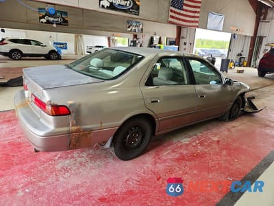 Trzecie zdjęcie samochodu z tyłu: 1999 TOYOTA CAMRY LE VIN:JT2BG22K0X0373427 - miniatura
