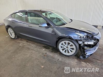 Czwarte zdjęcie samochodu z boku: 2022 TESLA MODEL 3 VIN:5YJ3E1EA7NF287772 - miniatura