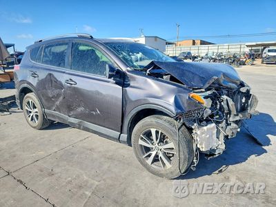 Czwarte zdjęcie samochodu z boku: 2018 TOYOTA RAV4 XLE VIN:JTMWFREV2JJ732661 - miniatura