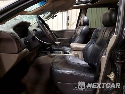 Zdjęcie 7 z 14 samochodu: 2004 JEEP GRAND CHEROKEE LAREDO VIN:1J4GW48S44C368609 - miniatura