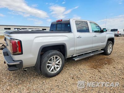 Trzecie zdjęcie samochodu z tyłu: 2017 GMC SIERRA K1500 SLT VIN:3GTU2NEC6HG446821 - miniatura