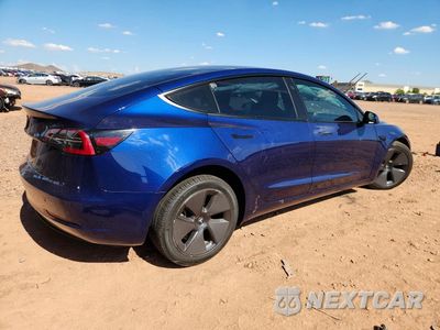 Trzecie zdjęcie samochodu z tyłu: 2023 TESLA MODEL 3 VIN:5YJ3E1EA0PF447347 - miniatura