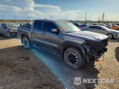 Czwarte zdjęcie samochodu z boku: 2024 NISSAN FRONTIER PRO-X VIN:1N6ED1EJ9RN673674 - miniatura