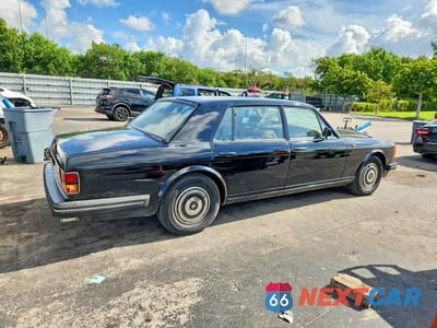 Trzecie zdjęcie samochodu z tyłu: 1989 ROLLS-ROYCE SILVER SPUR VIN:SCAZN02A0KCX26674 - miniatura