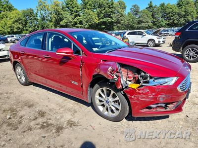 Czwarte zdjęcie samochodu z boku: 2017 FORD FUSION SE PHEV VIN:3FA6P0PUXHR303612 - miniatura