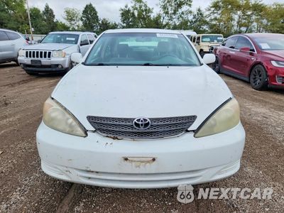 Piąte zdjęcie samochodu w środku: 2004 TOYOTA CAMRY LE VIN:JTDBE32K640282578 - miniatura