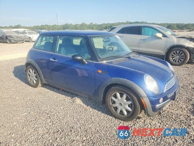 Czwarte zdjęcie samochodu z boku: 2003 MINI COOPER VIN:WMWRC33483TE15553 - miniatura