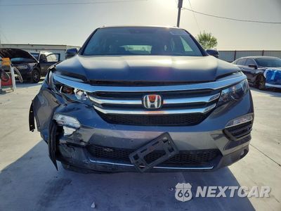 Piąte zdjęcie samochodu w środku: 2017 HONDA PILOT ELITE VIN:5FNYF6H03HB033208 - miniatura