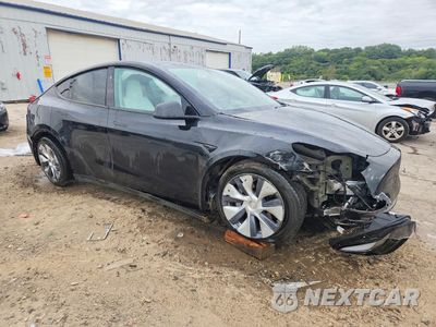 Czwarte zdjęcie samochodu z boku: 2023 TESLA MODEL Y VIN:7SAYGDEE2PA161987 - miniatura
