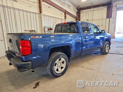 Trzecie zdjęcie samochodu z tyłu: 2016 CHEVROLET SILVERADO K1500 LT VIN:1GCVKREC0GZ203659 - miniatura