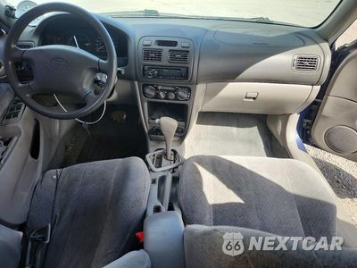 Zdjęcie 8 z 14 samochodu: 1999 TOYOTA COROLLA VE VIN:1NXBR12EXXZ266539 - miniatura