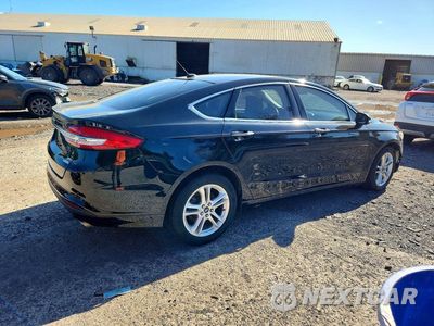 Trzecie zdjęcie samochodu z tyłu: 2018 FORD FUSION SE VIN:3FA6P0HD0JR220906 - miniatura