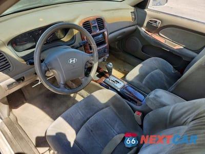Zdjęcie 8 z 12 samochodu: 2003 HYUNDAI SONATA GLS VIN:KMHWF35H23A878564 - miniatura