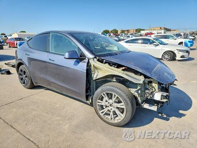 Czwarte zdjęcie samochodu z boku: 2023 TESLA MODEL Y VIN:7SAYGDEE4PA157701 - miniatura