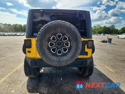 Zdjęcie 7 z 15 samochodu: 2015 JEEP WRANGLER UNLIMITED RUBICON VIN:1C4BJWFG1FL612373 - miniatura