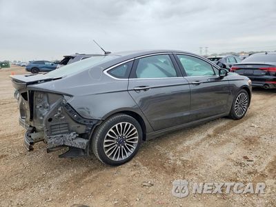 Trzecie zdjęcie samochodu z tyłu: 2017 FORD FUSION TITANIUM VIN:3FA6P0D90HR291650 - miniatura