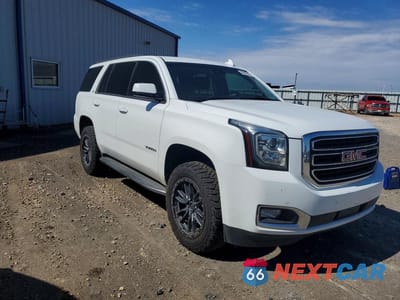 Czwarte zdjęcie samochodu z boku: 2020 GMC YUKON SLT VIN:1GKS2BKC4LR258273 - miniatura